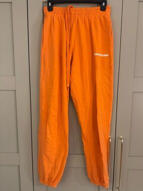 TALENTLESS Orange Logo Sweatpants